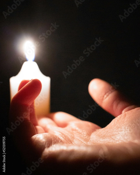 Obraz Hand holding candle