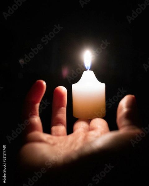 Obraz Hand holding candle