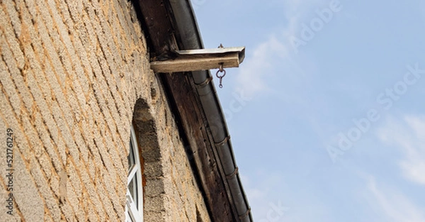 Obraz old hook on a building