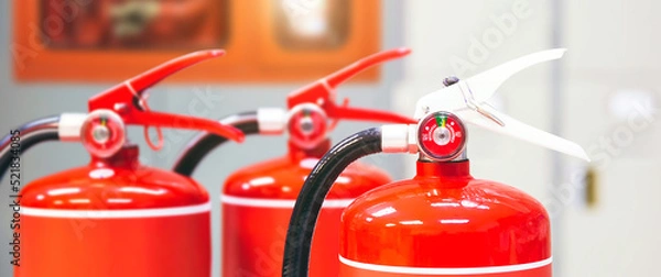 Fototapeta Fire extinguisher, Close-up red fire extinguishers tank in the building for fire equipment for extinguishing or protection and prevent for emergency and safety rescue and alarm system training.