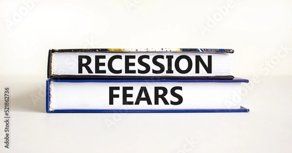 Fototapeta Recession fears symbol. Concept words Recession fears on books on a beautiful white table white background. Business and recession fears concept. Copy space.
