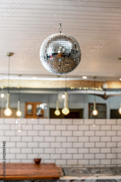 Fototapeta disco ball on the ceiling