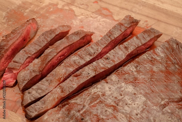 Fototapeta Roast beef from tenderloin A large piece is cut into pieces