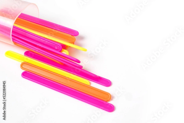 Obraz counting colorful sticks for the purposes of early education, development, learning to count and play. Banner with colored sticks on isolated white background
