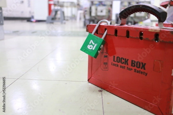 Obraz Lock box and switch gear room background ,Lockout Tagout , Electrical safety system.Key lock switch or circuit breaker for safety protect.in electric room