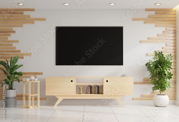 Obraz TV on the wall in the living room decorated with a table and flower pots on the tiled floor.3d rendering.