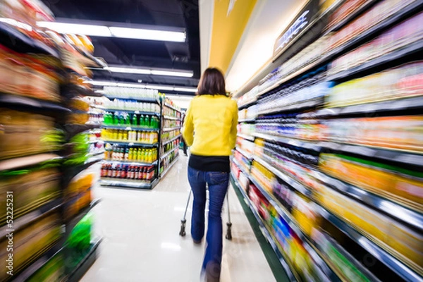 Obraz shopping at the supermarket,motion blur