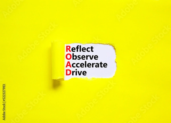 Fototapeta ROAD reflect observe accelerate drive symbol. Concept words ROAD reflect observe accelerate drive on white paper, yellow background. Business ROAD reflect observe accelerate drive concept. Copy space.