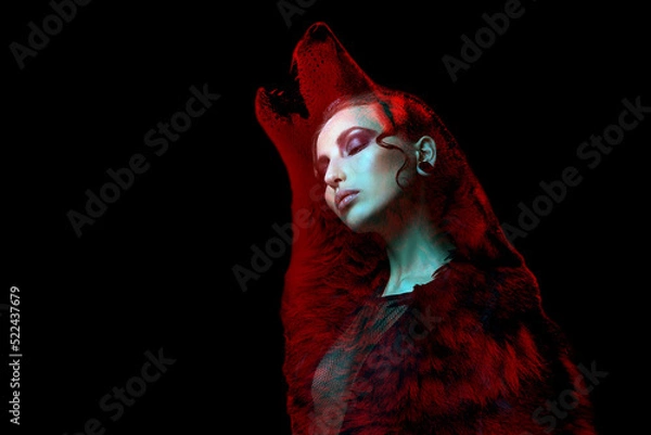 Fototapeta Gothic girl and wolf double exposure on black background. Werewolf concept. space for text
