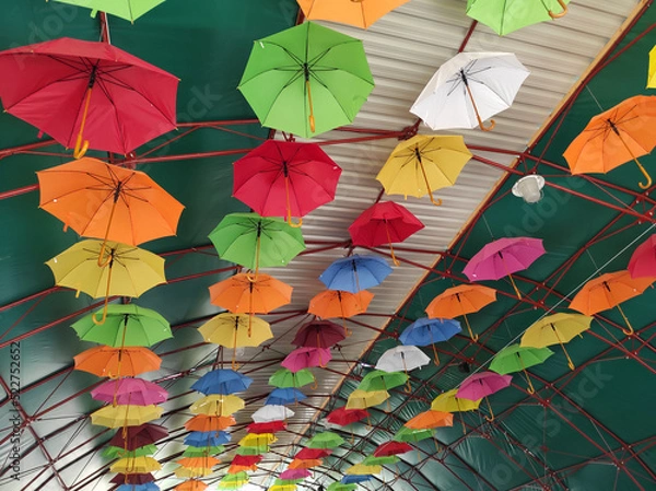 Fototapeta decoration made out of colorful hanging umbrellas 