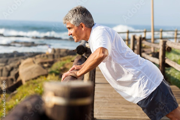 Obraz fit senior man exercising at the beach