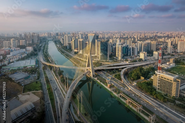 Fototapeta Aerial view of Octavio Frias de Oliveira Bridge (Ponte Estaiada) over Pinheiros River at sunset - Sao Paulo, Brazil