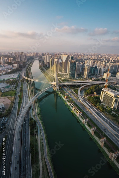 Fototapeta Aerial view of Octavio Frias de Oliveira Bridge (Ponte Estaiada) over Pinheiros River at sunset - Sao Paulo, Brazil