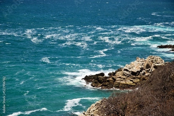 Obraz waves crashing on rocks