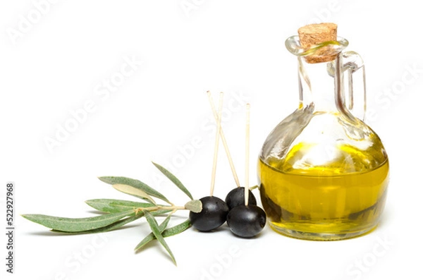 Fototapeta Olive oil in a bottle with olives and a olive twig