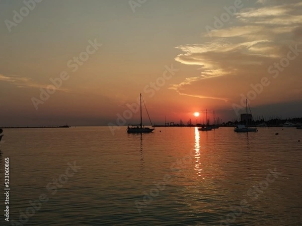 Fototapeta Coucher le Soleil a Umag.