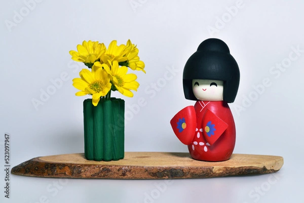 Obraz 人形と菊の花