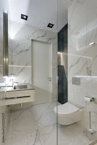 Obraz modern bathroom interior, bathroom with white tile with stone texture, glossy porcelain tile in the bathroom