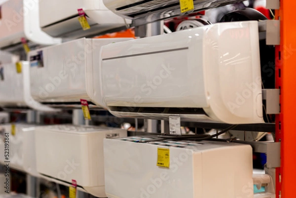 Fototapeta Assortment of air conditioners on the showcase of the electronic store