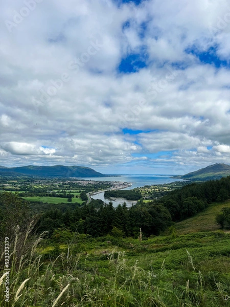 Obraz The flagstaff viewpoint area, countryside, Newry, with Warrenpoint town in the distance during the summer. Hiking and Tourism concept