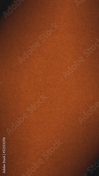 Fototapeta Dark orange colored paper texture. Bright brown vertical background. Mobile phone wallpaper with vignetting. Textured surface, fibers and irregularities are visible. Top-down
