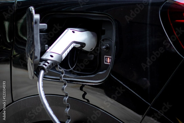Fototapeta Electric car charging