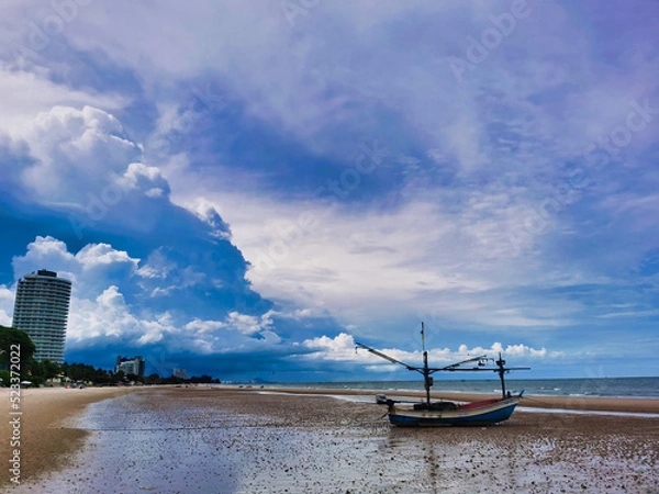 Obraz Fishing boat on the beach of Hua Hin, Thailand.  Beautifull sky.