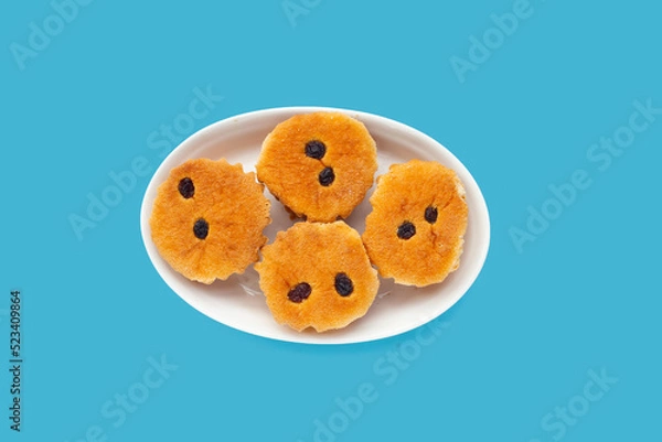 Obraz Mini castella cake on blue background.