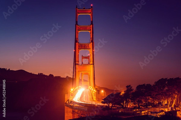 Obraz golden gate bridge at dusk bright lights traffic
