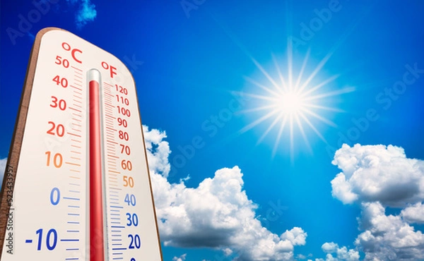 Obraz low angle view Thermometer on blue sky with sun shining in summer show higher Weather, concept global warming, climate change