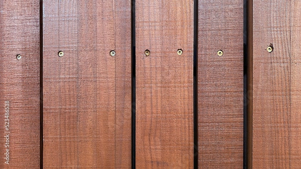 Obraz Close-up of cedar wood cladding wall planks with visible screw heads
