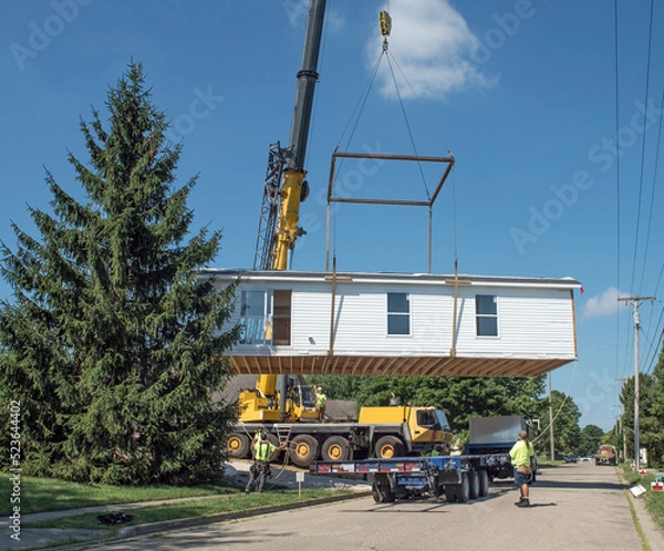 Obraz Modular Home Lifted from Carrier Truck 