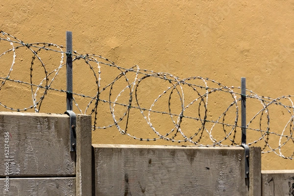 Fototapeta Mauer, Stacheldraht, Symbolbild