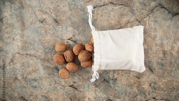 Obraz Top view walnuts on marble table