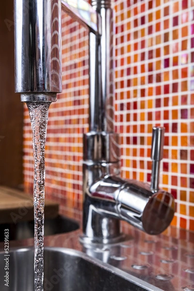 Fototapeta kitchen faucet flowing