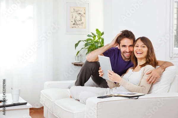 Obraz Young couple with digital tablet at home