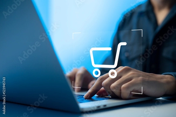Fototapeta shopper using laptop and touch virtual screen online shopping. And online payment option or digital wallet online transaction concept.