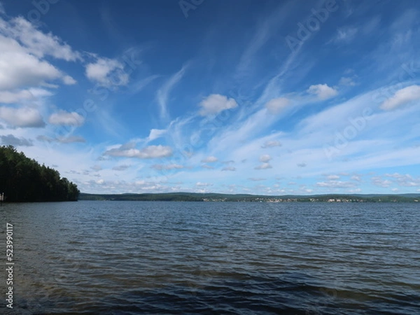 Fototapeta clouds over the lake