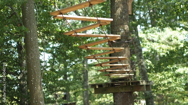 Fototapeta Accrobranche, adventure treetop park ropes and elements, for tree climbing sport and accrobranche