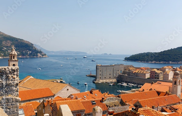 Fototapeta Port of Dubrovnik from the old city walls in a sunny day