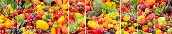 Fototapeta Wide background of fresh bright vegetables and fruits