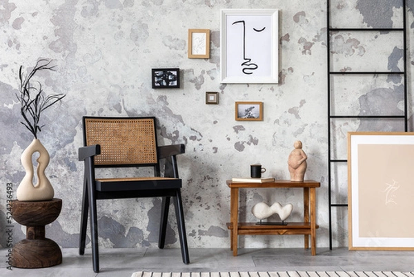 Fototapeta Loft style of modern apartment with design black chair, shelf, carpet and composition of wall art gallery. Minimalist home decor. Template. Grunge concrete wall.	
