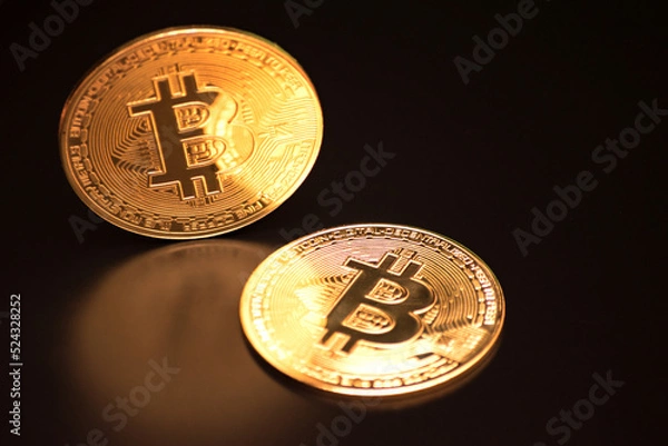 Obraz Bitcoin on a black background with reflection
