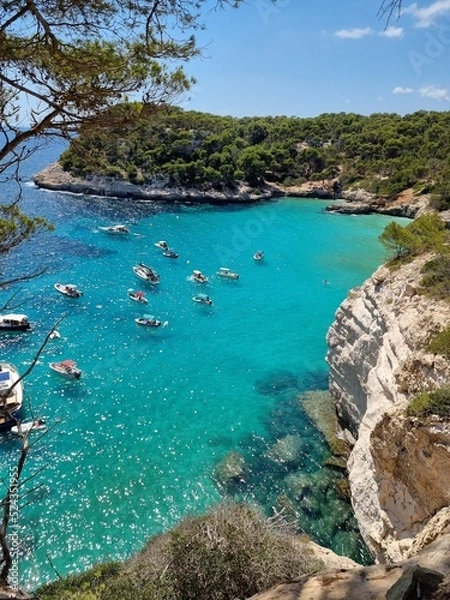 Obraz View of turquoise sea in beautiful bay Cala Mitjaneta in Menorca