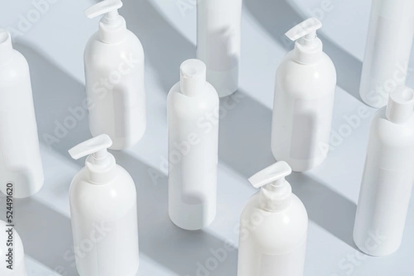 Fototapeta Set of dispenser bottles for soap and shampoo. shampoo bottle without logo