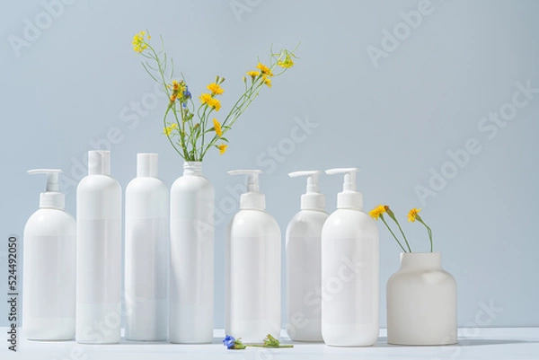 Fototapeta Set of dispenser bottles for soap and shampoo. shampoo bottle without logo