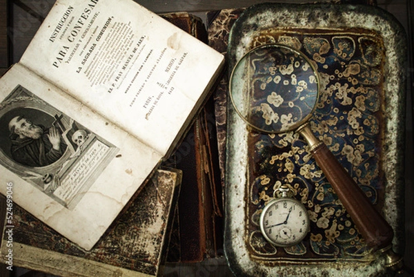 Obraz old book with antique clock