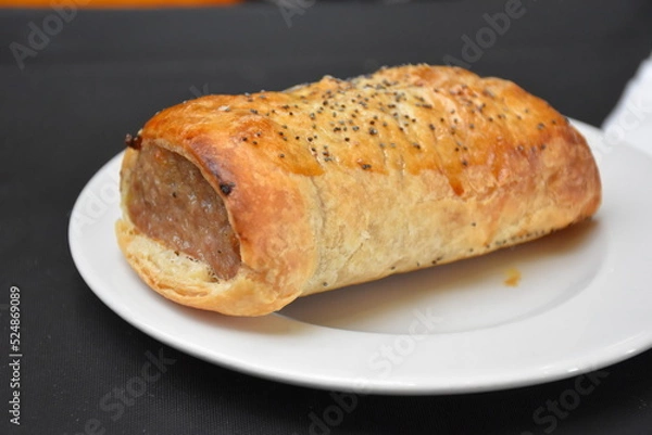 Obraz Sausage roll on the white plate