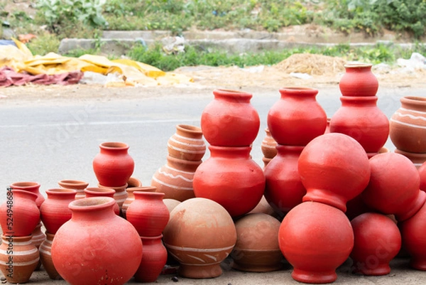Obraz Handmade Terracotta Ceramic Clay-Based Earthenware Used For Cooking Or Storing Food And During Traditional Festival Celebration In India. Piled Up Variety Of Unglazed Or Glazed Hard, Fired Ceramic