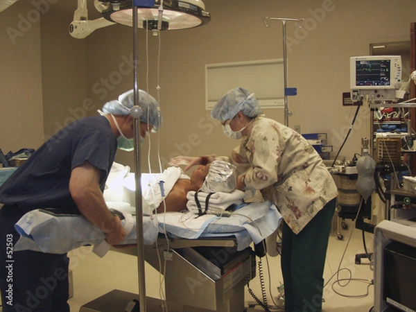 Obraz positioning patient on o.r. table